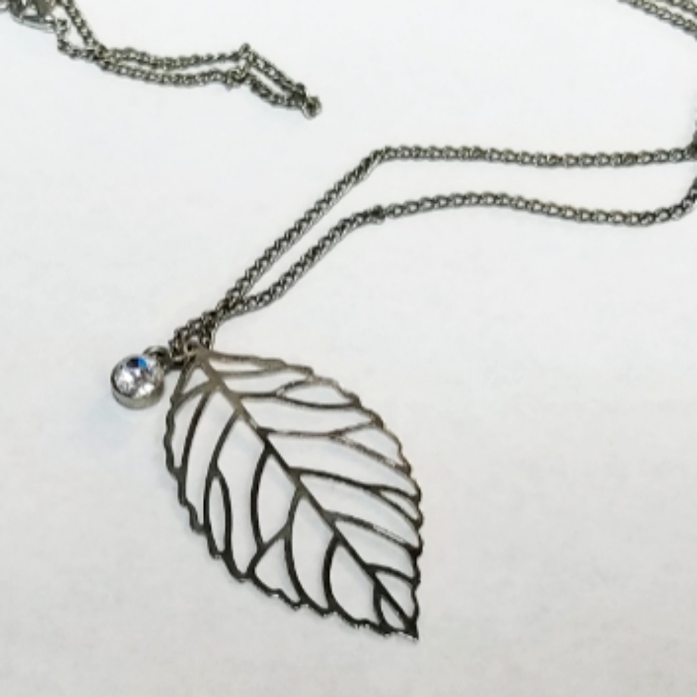 Anthropologie Laser Cut Silver Monstera Adasonii Plant Leaf CZ Chain Necklace